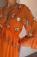 Apricot Embellished Ines Dress in orange sheer fabric with hand-embroidered mirror detailing and a ruffled peplum.