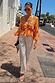 Apricot Embellished Top featuring mirror work and a peplum hem, worn with silver sequin Naomi trousers.