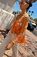 Apricot Embellished Top with mirror embroidery and frill sleeves, styled with silver sequin trousers.