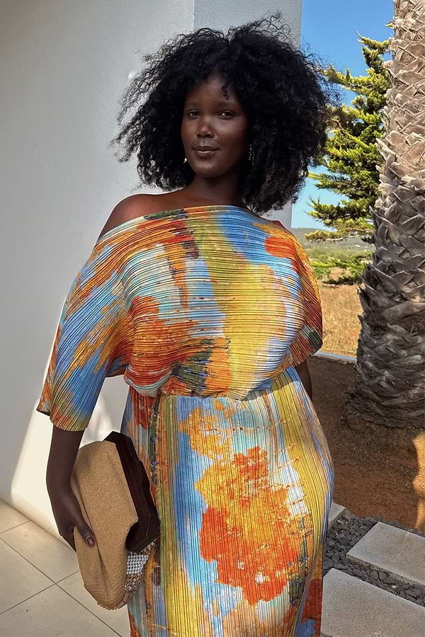 Artist Tilly Dress in a multicoloured abstract print with a pleated texture, showcasing inclusive sizing for vacation.