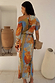 Thumbnail for Artist Tilly Dress in a multicoloured abstract print and plissé fabric, featuring an asymmetric neckline, shown from the back.