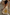 Thumbnail for Yellow Stripe Ashley Dress featuring a large sun motif and ruffled bandeau top, captured on a sunlit street.