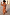 Thumbnail for Model wearing peach Paisley Balloon Trousers and matching top in a sunny outdoor setting.