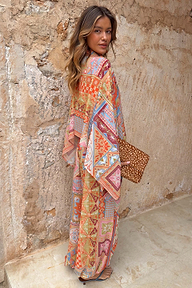 Dolce Vita Balloon Trousers in a multi-coloured tile print with geometric motifs, styled as a vibrant co-ord set.