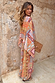 Dolce Vita Balloon Trousers in a multi-coloured tile print with geometric motifs, styled as a vibrant co-ord set.