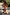 Thumbnail for Girl's Banana Bikini with a multicoloured banana print and frill bandeau top, worn by a child running on sand.