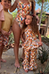 Girl's Banana Cotton Woven Set featuring a multicoloured print, peplum top and flared trousers on vacation.
