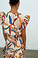Banana Kerri Top in a multi-coloured banana print with puff sleeves, shown from the back as a cotton co-ord.
