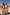 Thumbnail for Cream Boy's Banana Print Swim Shorts in recycled fabric, worn by two boys on a sunny beach vacation.