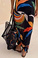 Black Mesh Tote Bag featuring a banana print pouch and leather straps, styled with a matching banana print skirt.
