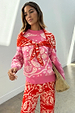 Iconic Pink Bandana Copenhagen Jumper with a red necktie and matching joggers in a bold bandana print.