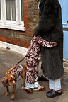 Chocolate Bandana Dog Jumper in a thick knit, styled with a matching kids' set for a London look.