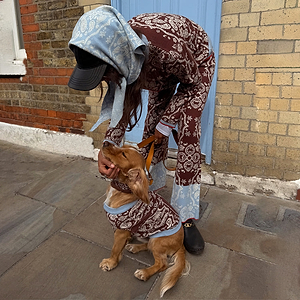 Chocolate Bandana Dog Jumper in a soft knit, matching the owner's bandana print outfit for an iconic London look.
