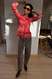 Red Bandana Alexa Cardigan featuring a white paisley print and ribbed texture, styled with leopard trousers.
