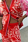 Red Bandana Martha Cardigan in a soft knit with pink trim, paired with matching red and pink joggers.
