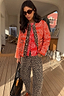 Quilted Red Bandana Reversible Jacket with leopard print trim, paired with leopard print trousers.