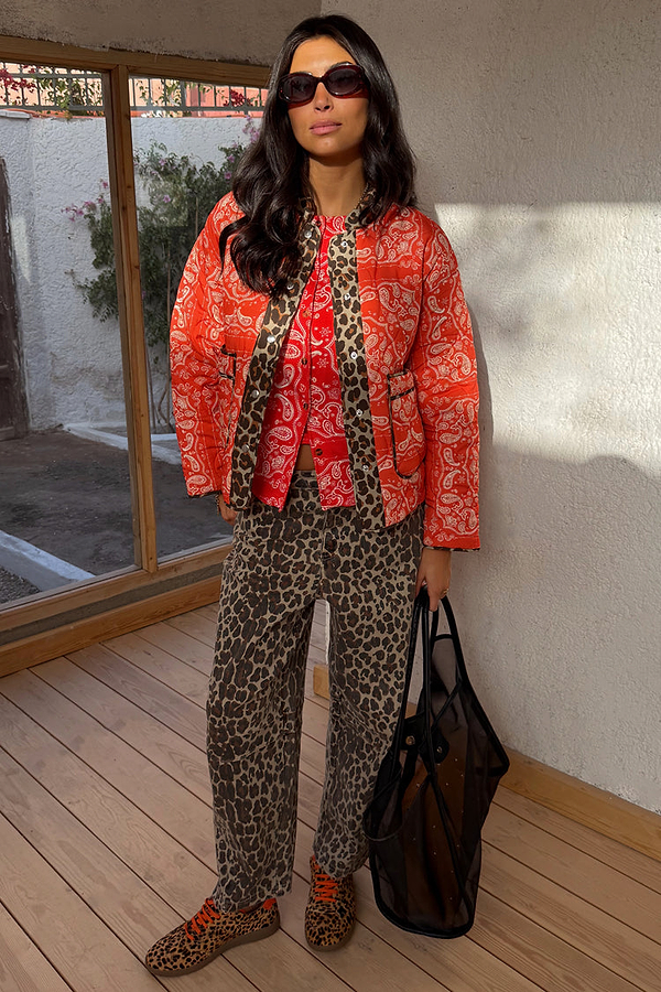 Red Bandana Reversible Jacket in quilted fabric with leopard print trim and in-house designed print.