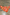 Thumbnail for Multi Stripe Mix Bandana featuring orange, tan and white stripes and a polka dot border, displayed on a concrete floor.