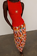 Cirque Beatrice Skirt featuring a multi-coloured geometric diamond print, cirque motifs and a pleated A-line hem.