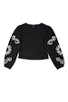 Black cotton Enchanted Lillie Top with white sun embroidery on blouson sleeves and back button fastening.