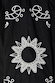 Black Enchanted Lillie Top detail featuring white sun and paisley embroidery with intricate cut-out motifs.