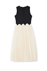 Black and Cream Monika Dress back view with a scalloped waist and cream pleated tulle mesh midi skirt.