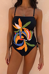 Black Banana Bandeau Swimsuit with colourful embroidered motifs and adjustable ruched tie sides.