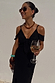 Multi-wear Black Cassie Dress in a linen blend with off-the-shoulder sleeves and tie front for vacation.