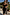 Thumbnail for Black Cassie Dress in a multi-wear off-the-shoulder silhouette with a centre tie for a summer vacation look.