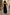 Thumbnail for Strapless Black Lola Mid-axi Dress in breathable cotton featuring a ruched bodice and full flowing skirt.