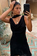 Black Sophie Mini Dress with a cowl neckline and multi-wear scarf, styled in a mirror selfie.