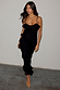 Black Molly Midi Dress featuring tiered ruffles on the neckline and skirt with thin adjustable straps.