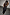 Thumbnail for Black Molly midi dress with tiered ruffles and spaghetti straps, shown from behind on a model.