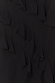 Black Molly Dress detail highlighting tiered ruffles and textured fabric.