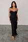 Black Molly Midi Dress with tiered ruffles at the neckline and skirt, featuring delicate adjustable spaghetti straps.