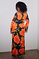 Black Poppy Aria Petite Mesh Dress with a large red poppy print on sheer fabric, shown from the back with long sleeves.