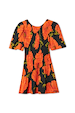NFD Black Poppy Mini Nara Dress featuring a shirred bodice, puff sleeves, and pleated skirt in an iconic print.