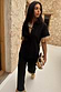 Thumbnail for Black Raffia Shirt with fringed sleeves and shell buttons, styled with the matching co-ord trousers.