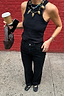 Thumbnail for Black Scallop Detail Jeans in a wide-leg fit, styled with a ribbed tank top and woven bag for a London street look.