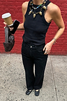 Black Scallop Detail Jeans in a wide-leg fit, styled with a ribbed tank top and woven bag for a London street look.