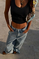 Black Scoop Neck Rib Tank in soft stretch ribbed fabric styled with baggy denim for a casual London look.