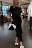 Thumbnail for Black Sequin Bow Dress featuring a black velvet multi-wear tie and shimmering sequins, styled with bow heels.