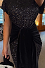 Black Sequin Bow Dress featuring shimmering sequins and a multi-wear velvet tie detail at the waist.