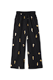 Black Shell Elissa Trousers with a gold metallic shell print, wide-leg silhouette and elasticated drawstring waist.