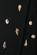 Black Shell Midi Leia Dress detail featuring metallic gold shell prints on soft black jersey fabric.