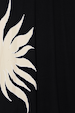 Black Sol Dorris Skirt detail featuring an in-house hand-painted sun print on black viscose jersey.