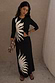 Thumbnail for Black Sol Alexa Cardigan and matching midaxi skirt co-ord with a large cream sun print on black ribbed fabric.