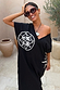 Black cotton Dolce Vita T-Shirt Dress featuring white sun motifs and a multi-wear, off-the-shoulder neckline.