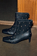 Black leather ankle boots with gold studs, a square toe and thin block heel, designed in London.