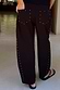 Thumbnail for Black Studded Barrel Jeans featuring silver stud detailing on the back pockets and seams with a barrel leg silhouette.